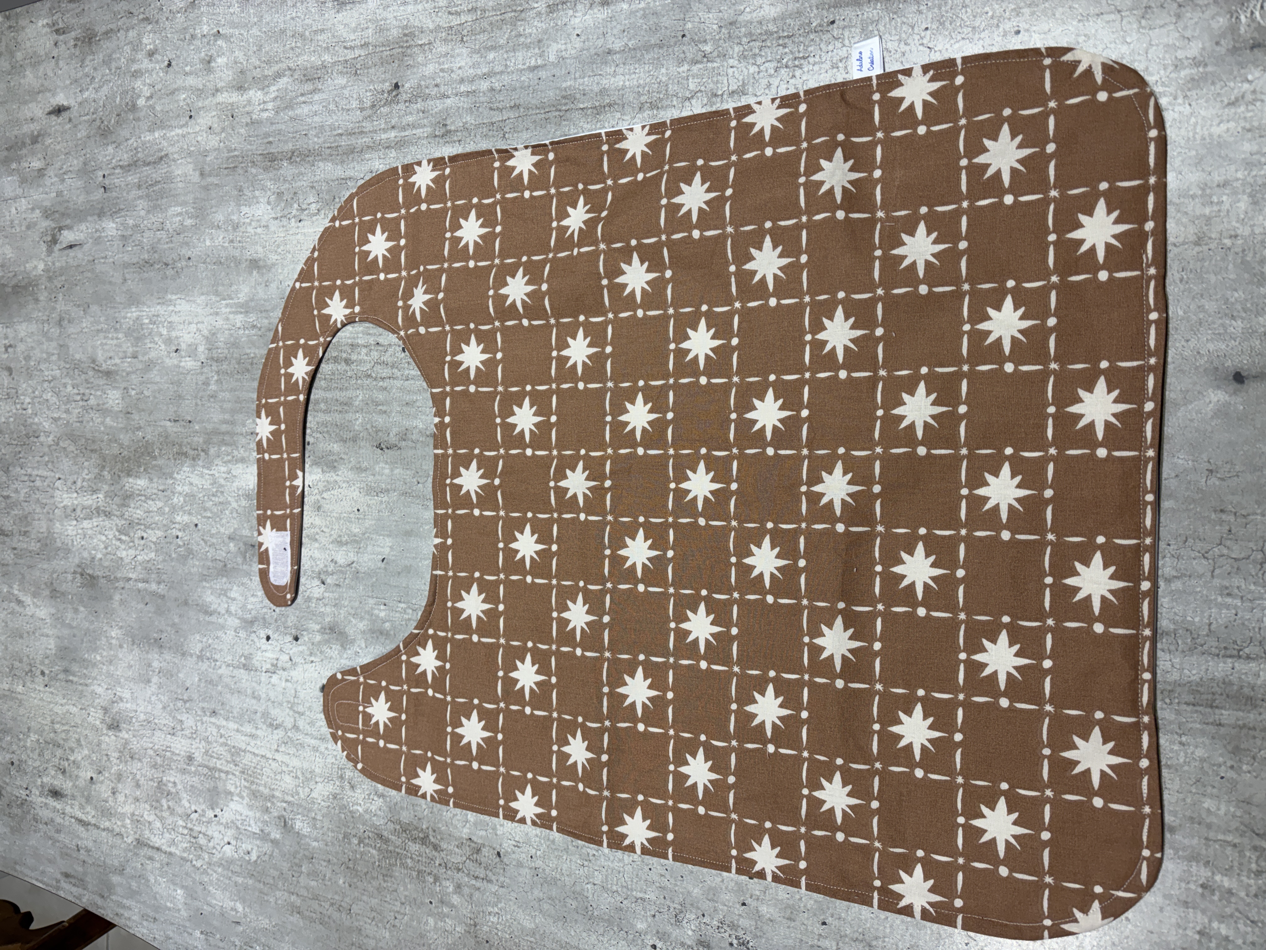 Serviette adulte (bavoir) imperméable